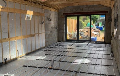 David Strudwick Gallery Image – 29 Interior of building under construction, showing timber ceiling and floor wiring
